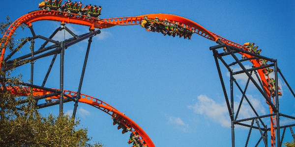 Visitors riding the red Tigris roller coaster at Busch Gardens, Tampa Bay, Florida